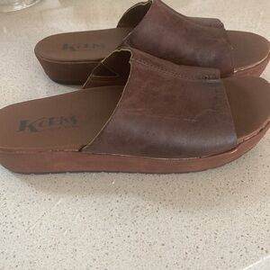 Brown leather platform slide sandals